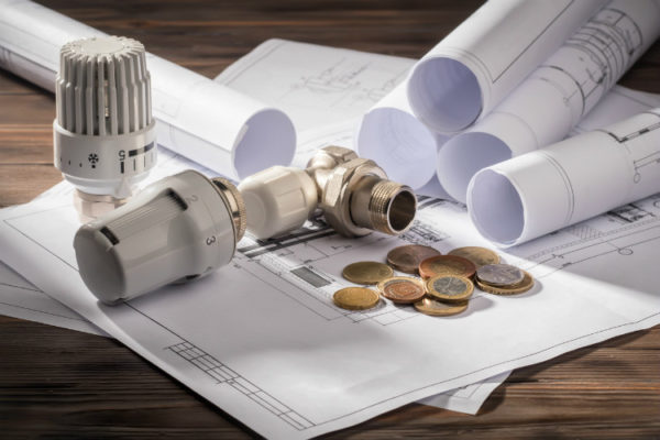 Thermostat liegt neben Geld