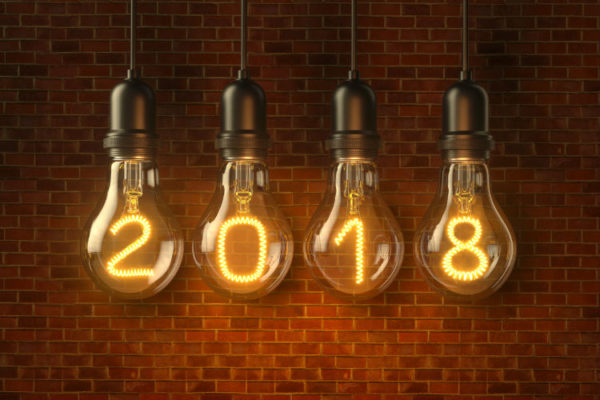 Lampentrends 2018 - Vier Glübirnen mit den Zahlen 2 0 1 8 als Leuchtdraht