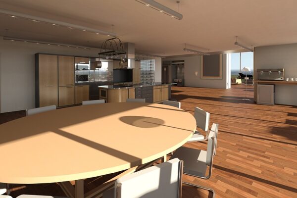 Runder Esstisch mit mehreren Stühlen steht mitten im Raum, im Hintergrund ist eine moderne offene Küche zu sehen