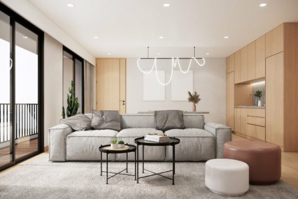 Ein modern eingerichtetes Wohnzimmer mit grauer Couch