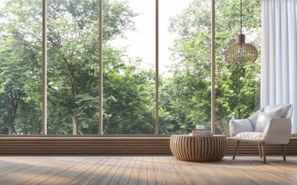 Minimalistischer Wohnstil - cleane Sitzecke vor großer Fensterwand